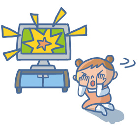 テレビの光の点滅をみる少女